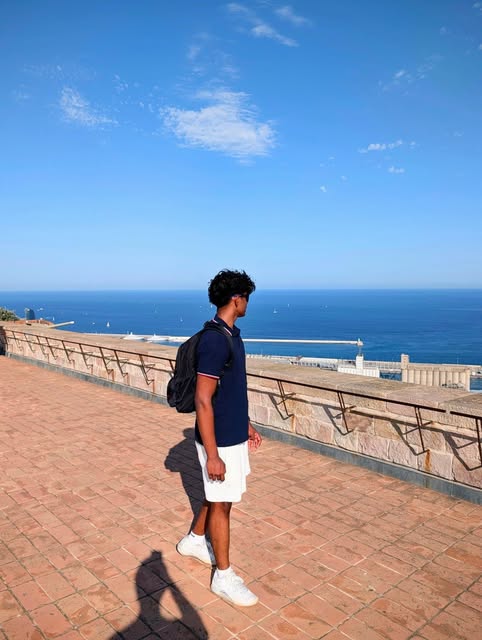Jonathan walking along the coast